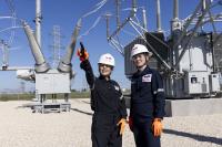 TotalEnergies Danish Fields Solar Farm (Texas, USA), Operators wearing their PPE in the electrical substation