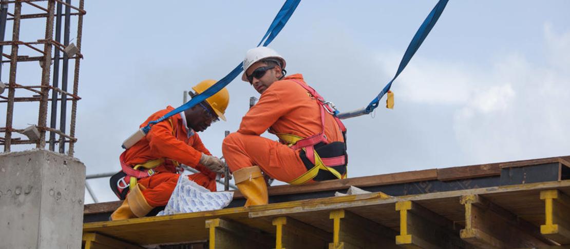 Operators with harnesses, Construction site
